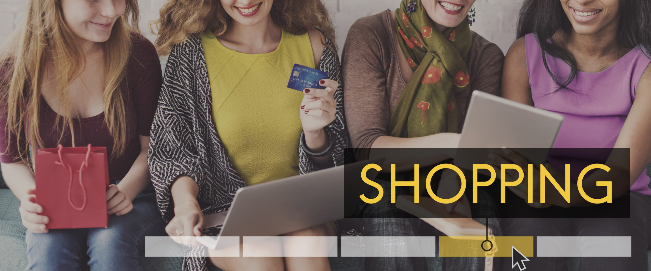 Customers Buying from eshop and holding shop bag, paycard, laptop and tablet